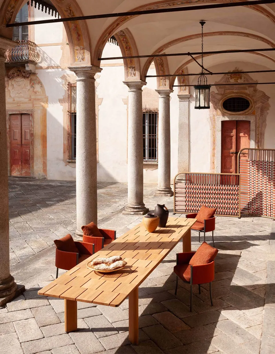 RODA Brick outdoor furniture on a terrace, catalog photograph 3