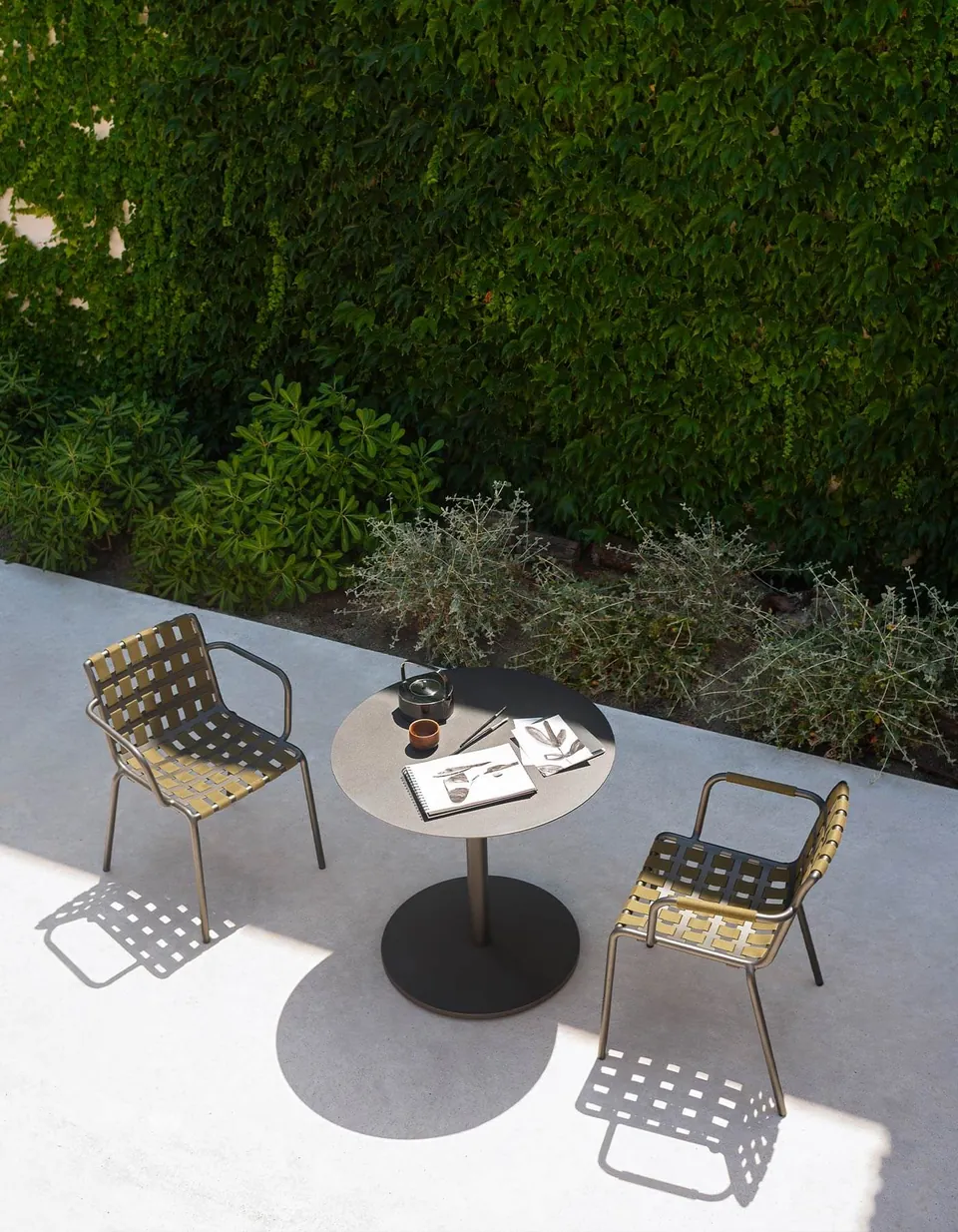 RODA Button outdoor furniture on a terrace, catalog photograph 3