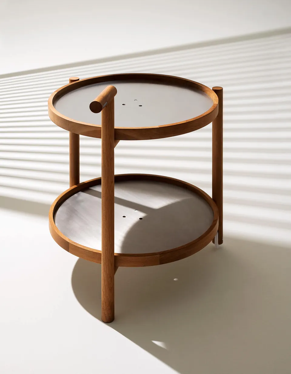 RODA Caddy bar trolley beside an outdoor dining table, RODA outdoor furniture catalog photograph