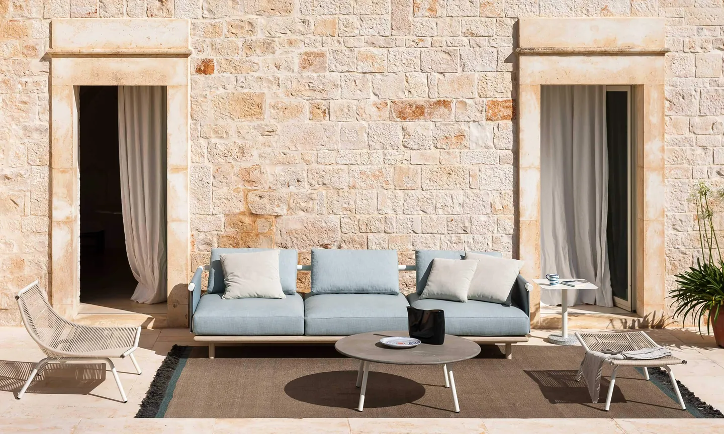 RODA Eden outdoor furniture on a terrace, catalog photograph 3