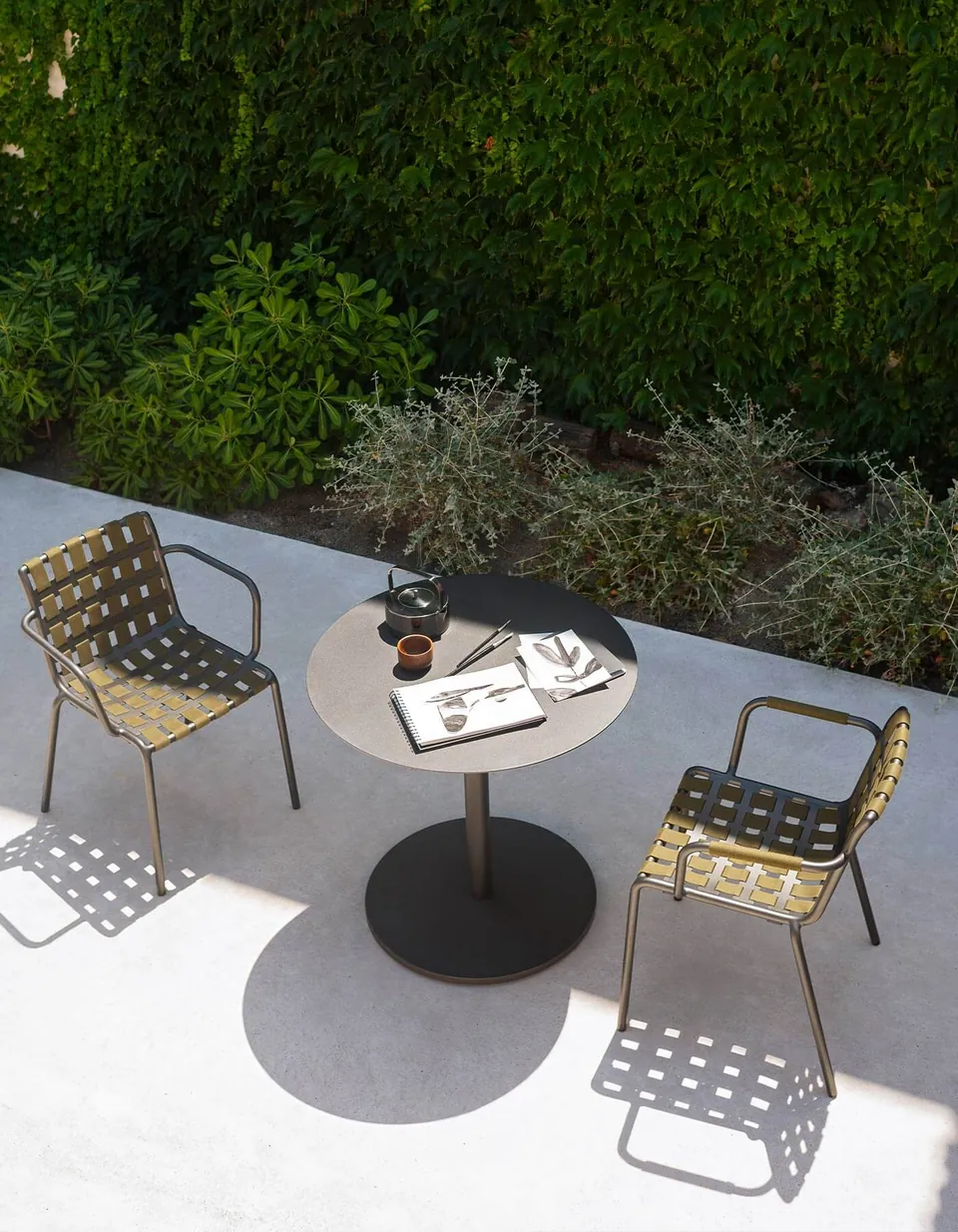 RODA Erice outdoor furniture on a terrace, catalog photograph 3