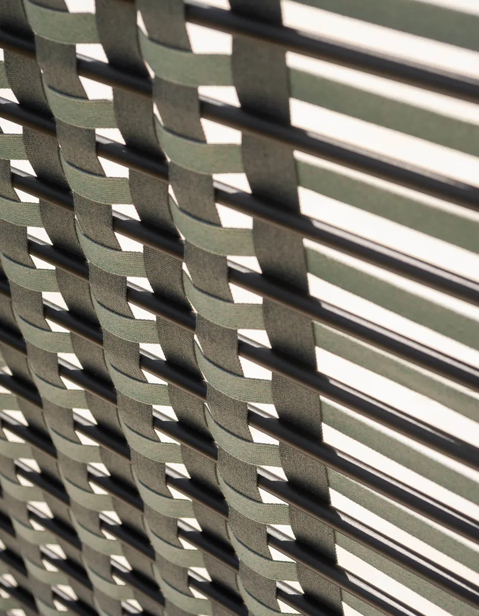 RODA Filet screens dividing a garden terrace, woven outdoor screen catalog photograph