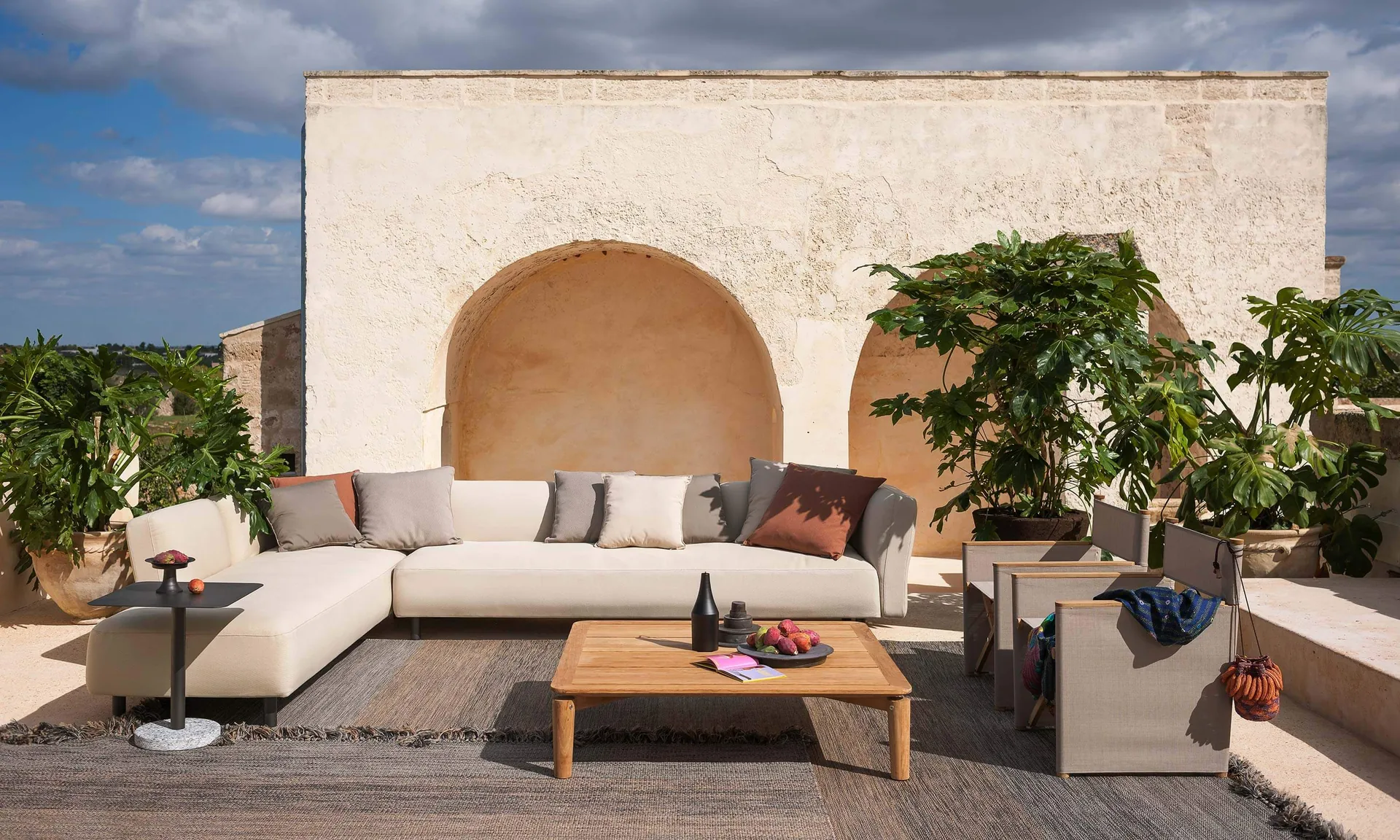 RODA Dandy modular outdoor sofa in fabric on a terrace, an Italian sofa for outdoor living