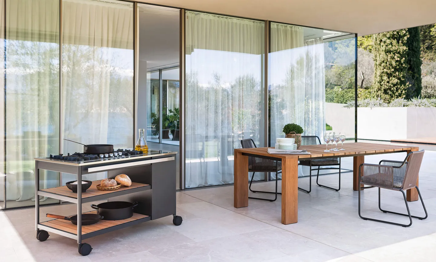 RODA Norma outdoor kitchen with sink module and stone counter on a terrace, RODA furniture catalog photograph