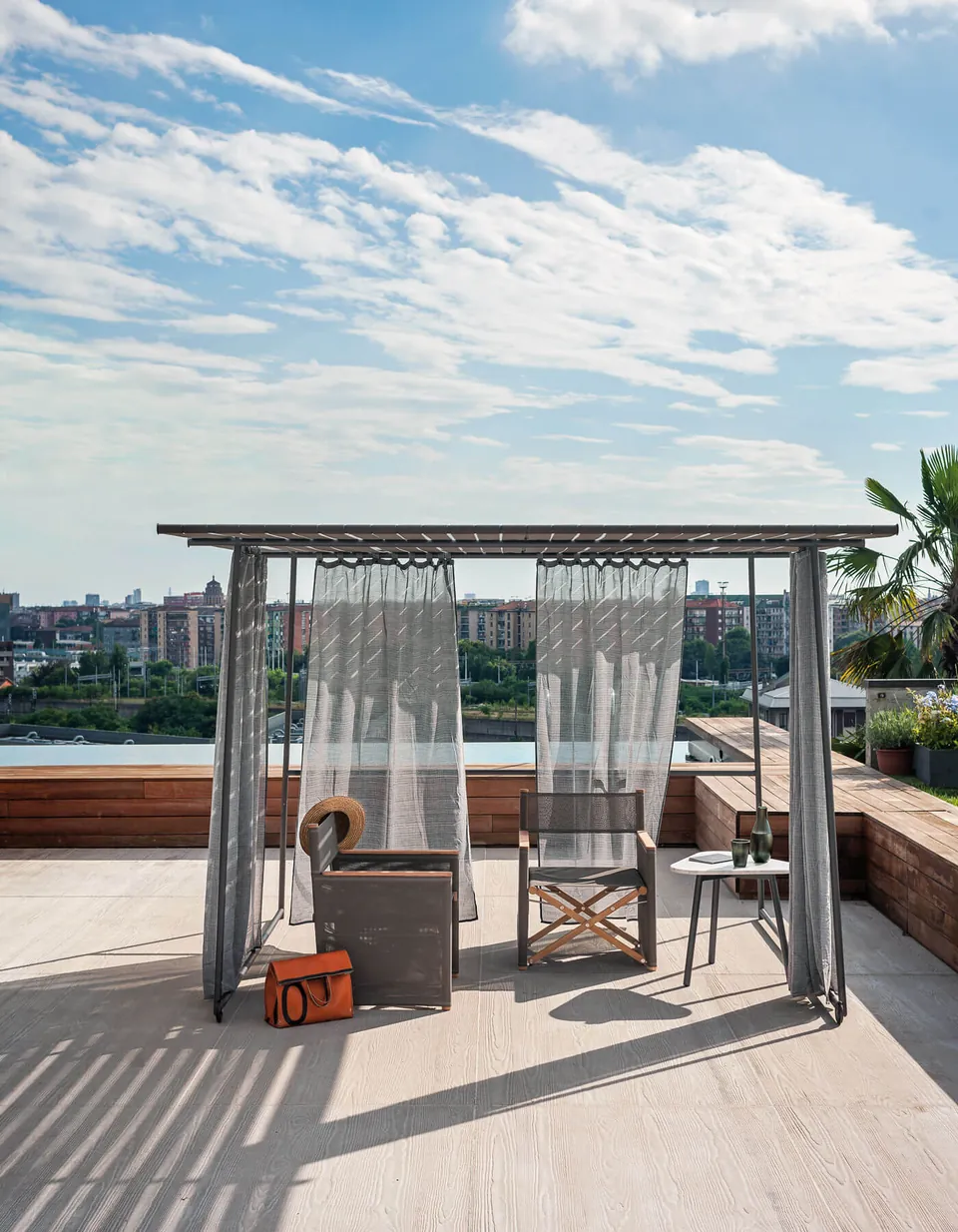 RODA Ombrina outdoor furniture on a terrace, catalog photograph 2