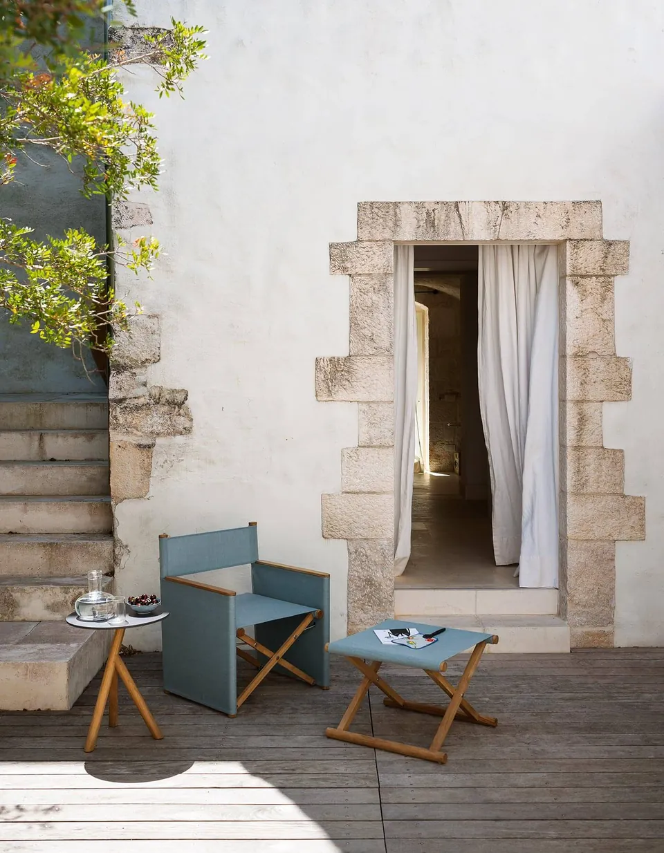 RODA Orson outdoor furniture on a terrace, catalog photograph 3