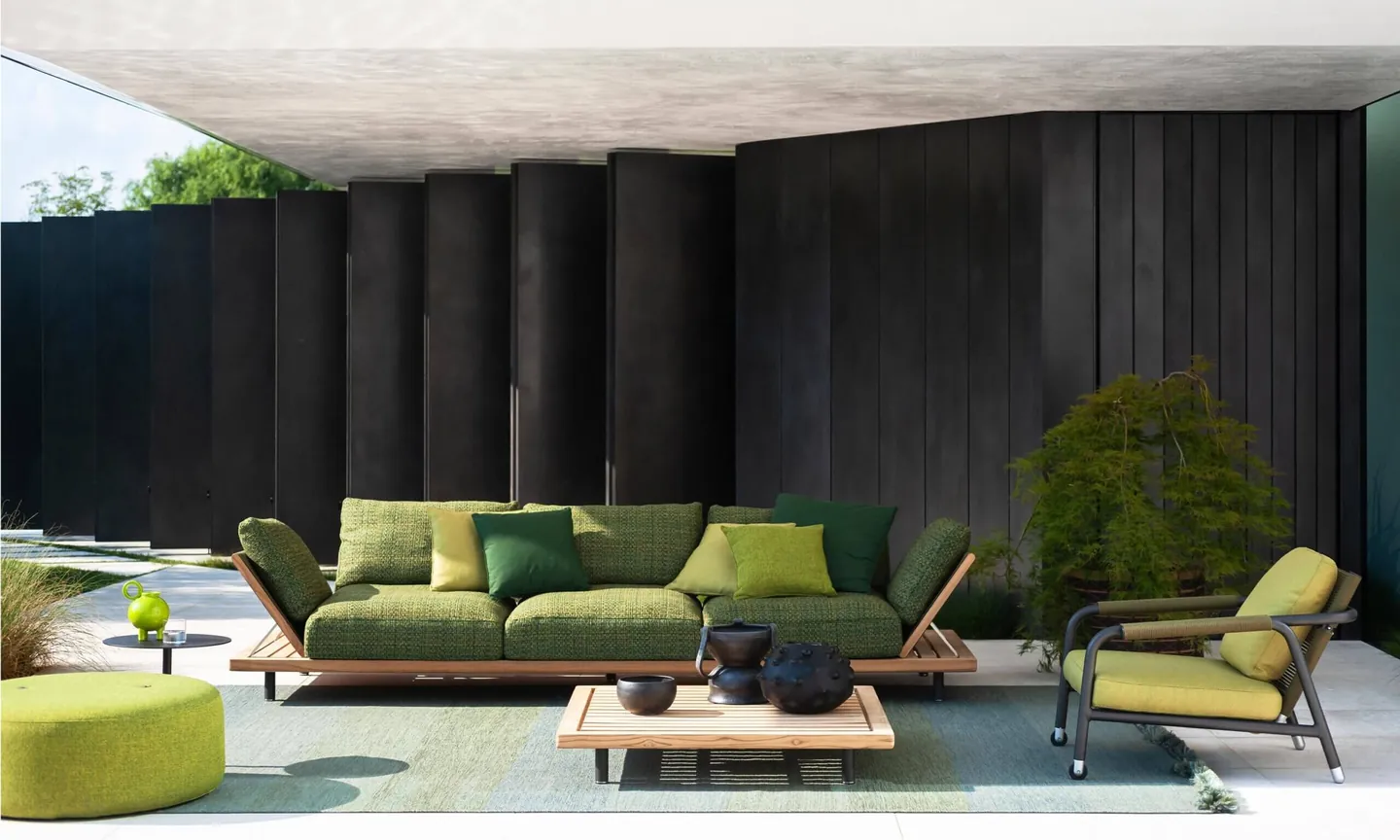 RODA Philia outdoor furniture on a terrace, catalog photograph 2