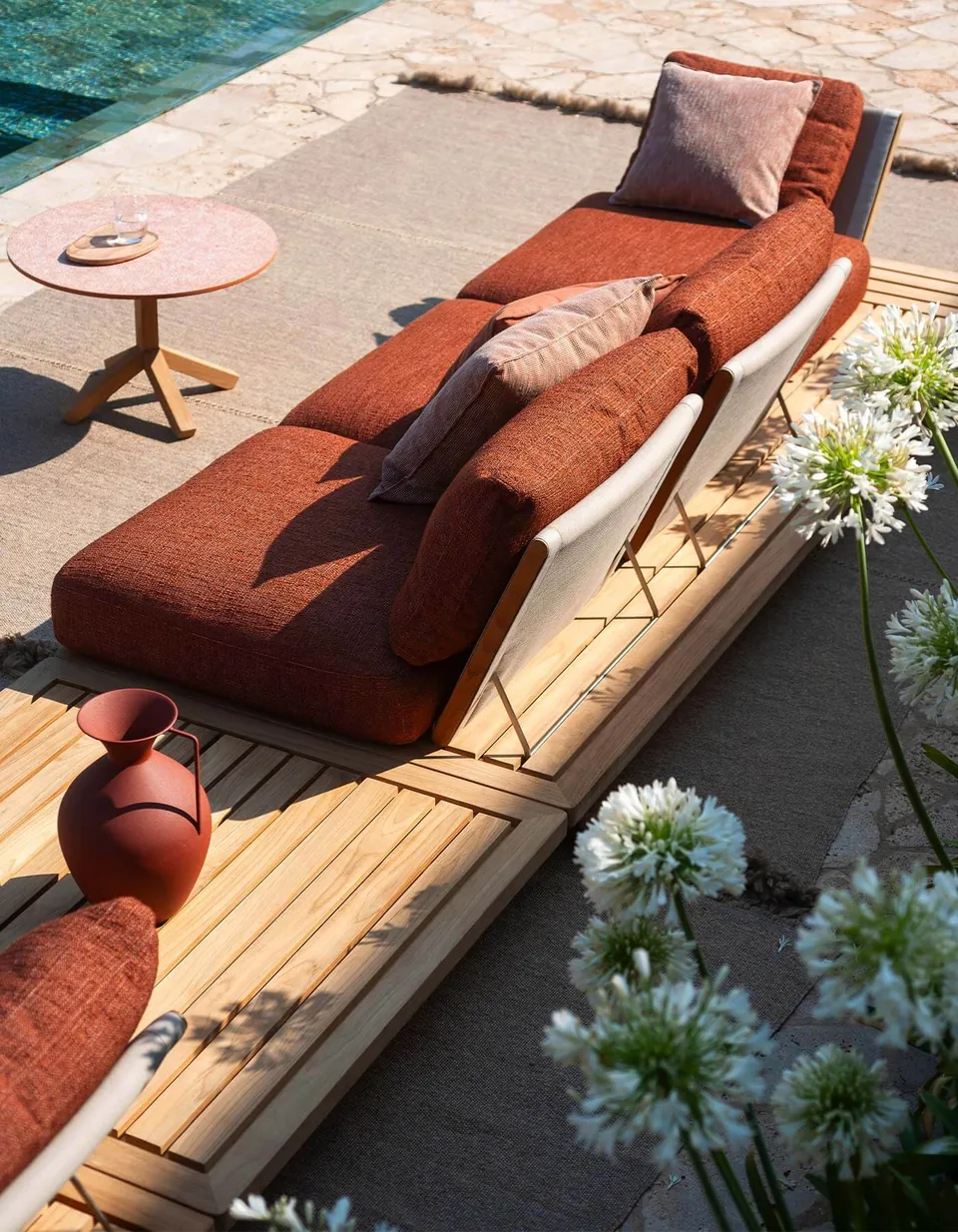 RODA Philia outdoor furniture on a terrace, catalog photograph 3
