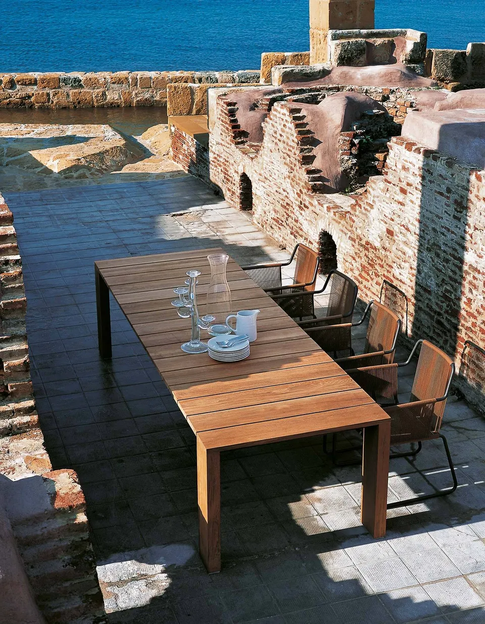 RODA Pier outdoor furniture on a terrace, catalog photograph 2