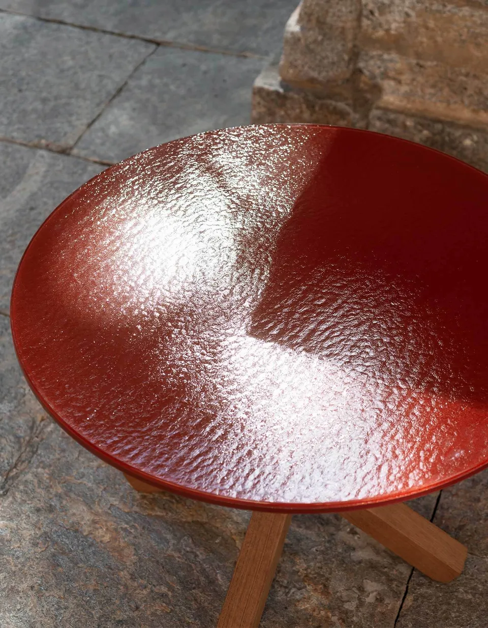 RODA Root teak tables beside outdoor lounge seating, RODA garden furniture catalog photograph