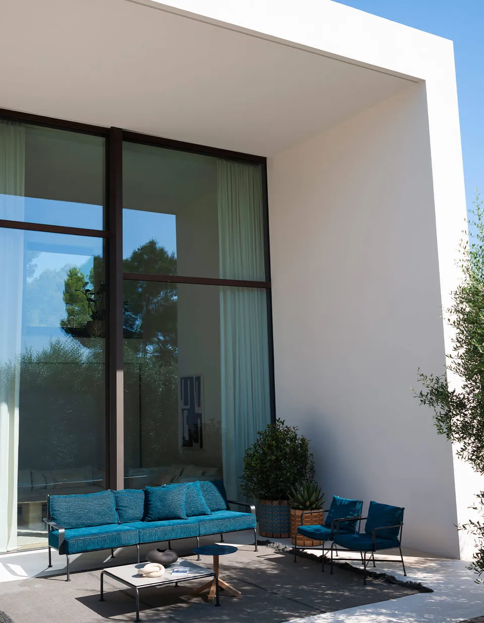 RODA Stresa outdoor furniture on a terrace, catalog photograph 2
