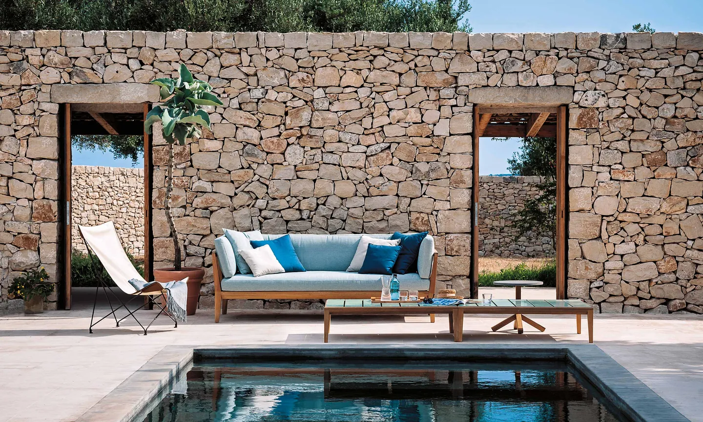 RODA Teka outdoor furniture on a terrace, catalog photograph 1