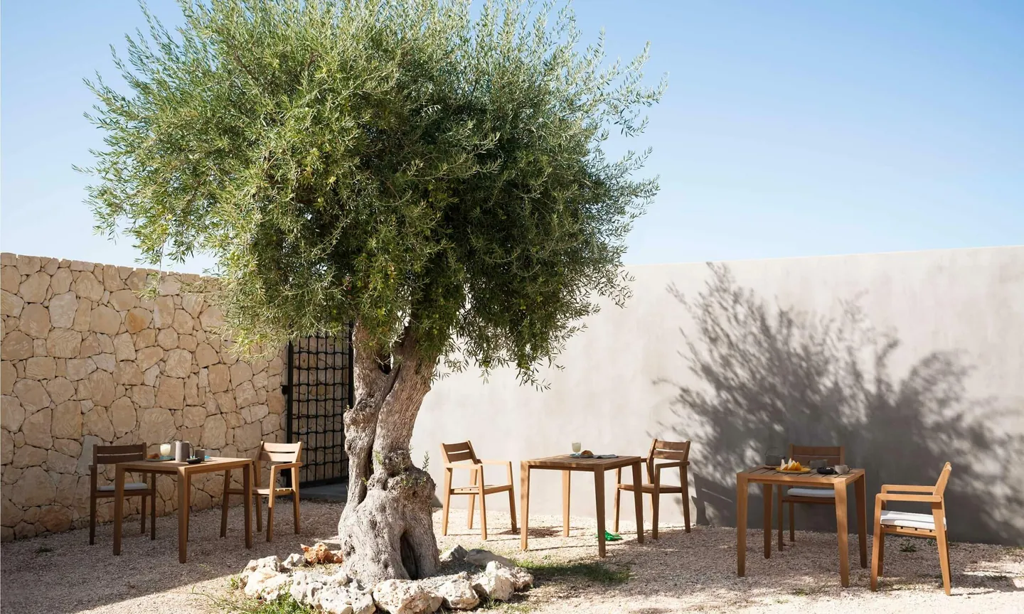 RODA Zania outdoor furniture on a terrace, catalog photograph 1